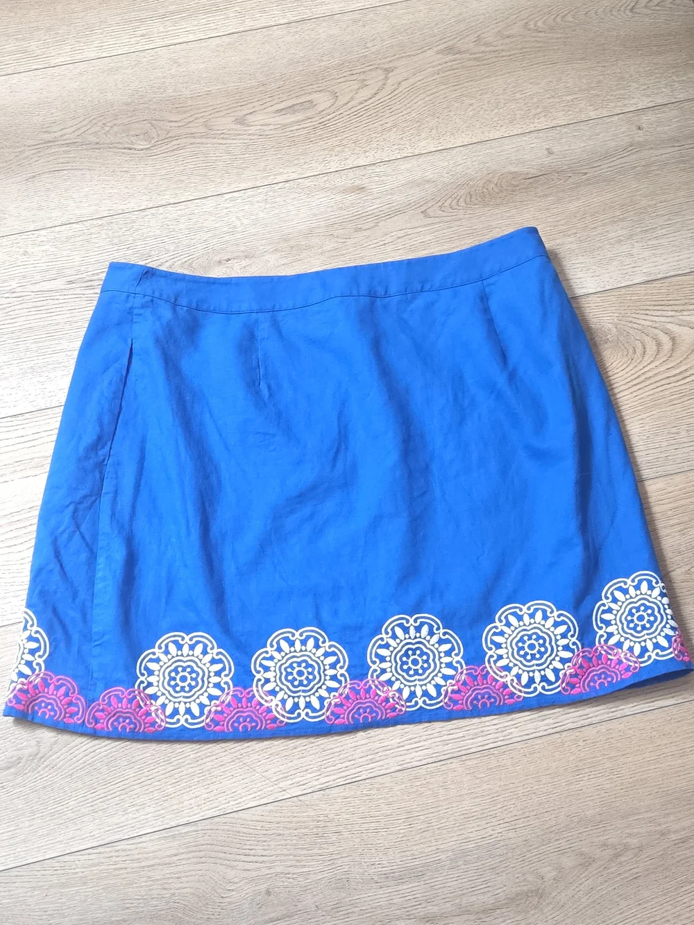 Boden Blue Mini Wrap Skirt with Pink  And White Embroidery Floral Border.
